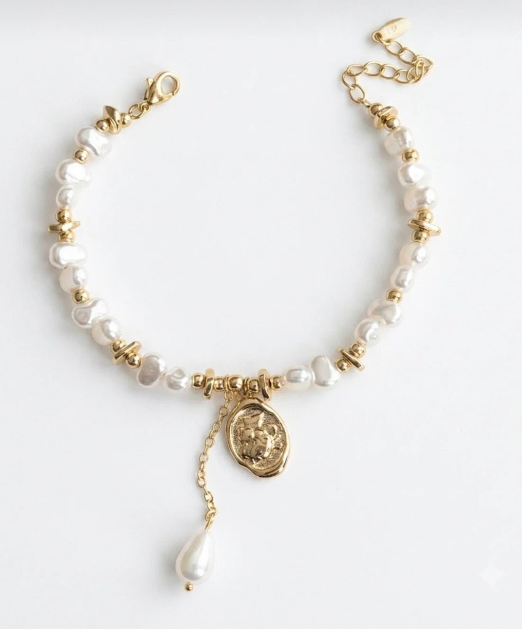 XIUPING İNCİLİ VINTAGE 14K
BİLEKLİK